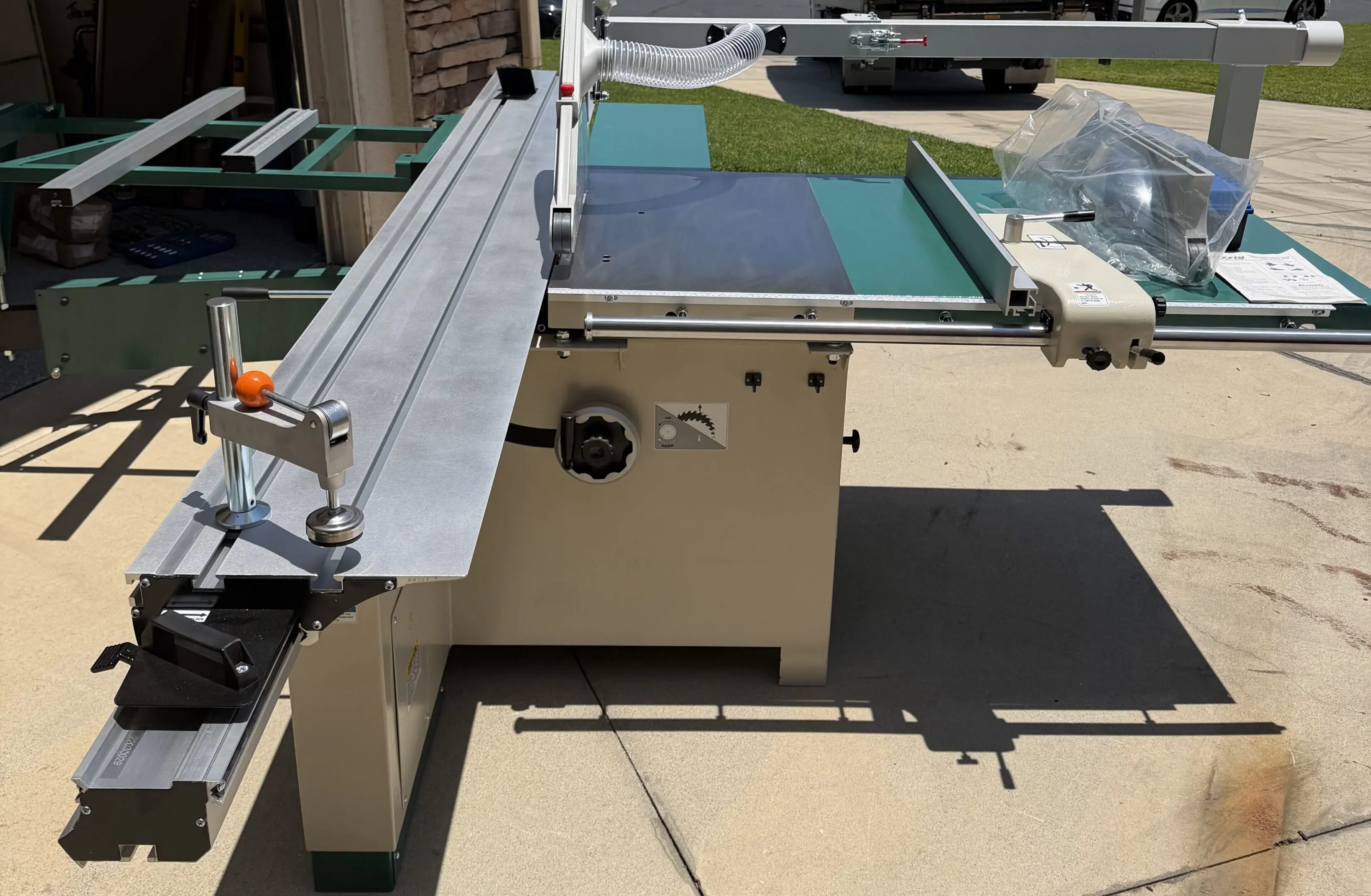 Sliding table saw on driveway