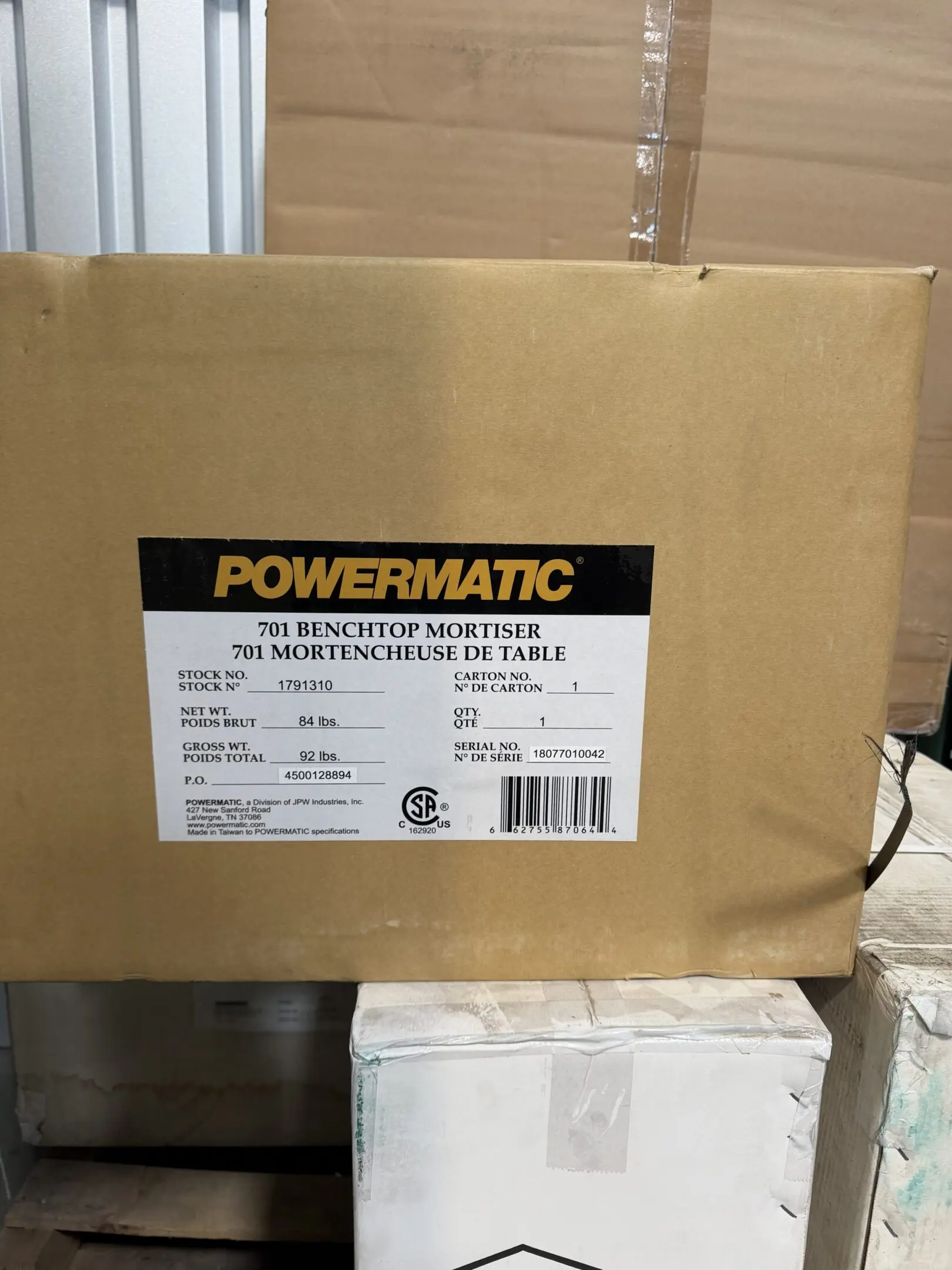 Powermatic 701 benchtop mortiser boxed on pallet