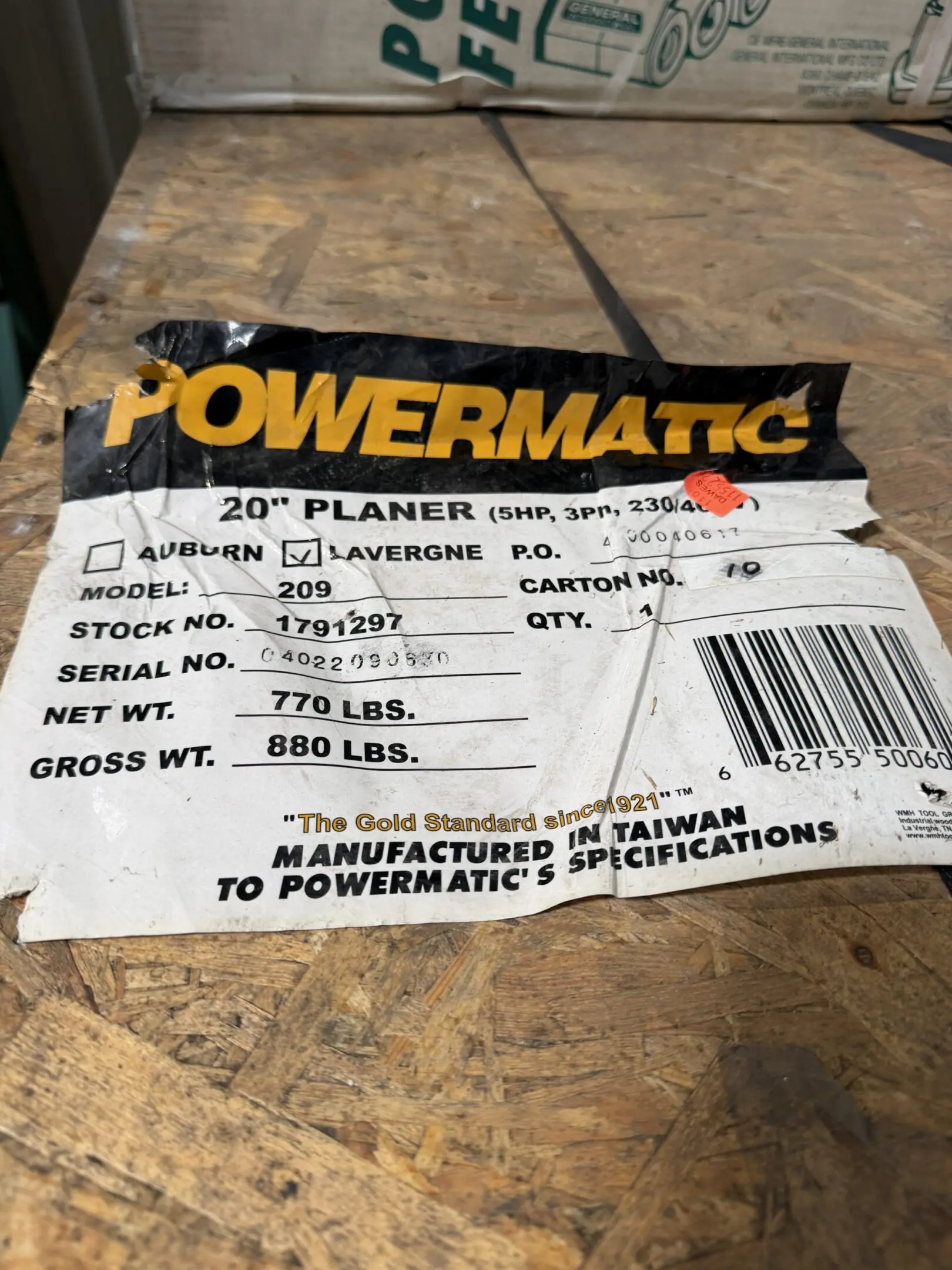 Powermatic 20-inch planer label on wood