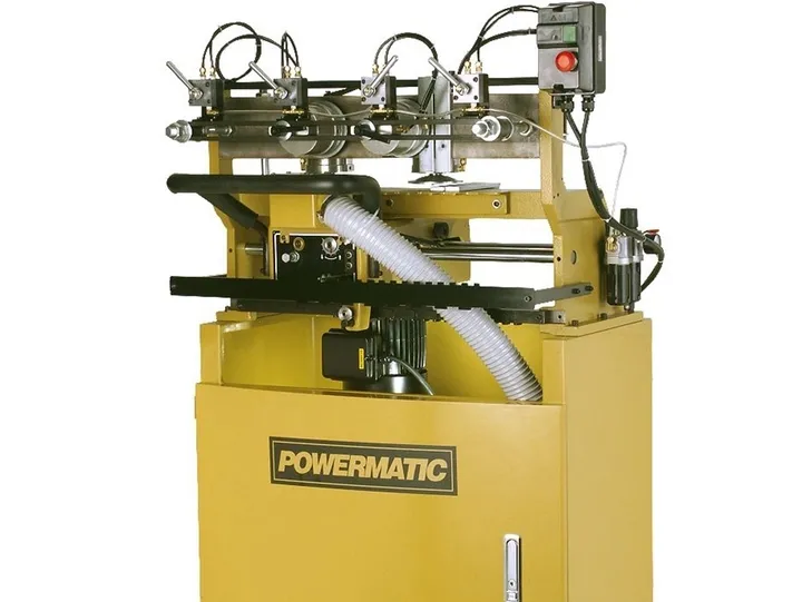 Yellow industrial drill press machinery