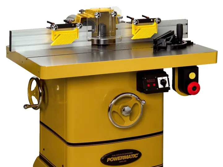 Yellow table saw with controls
