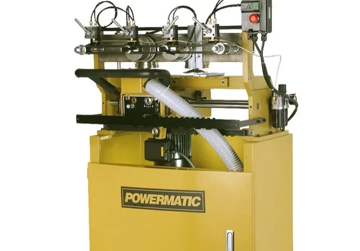 Yellow industrial drill press machinery